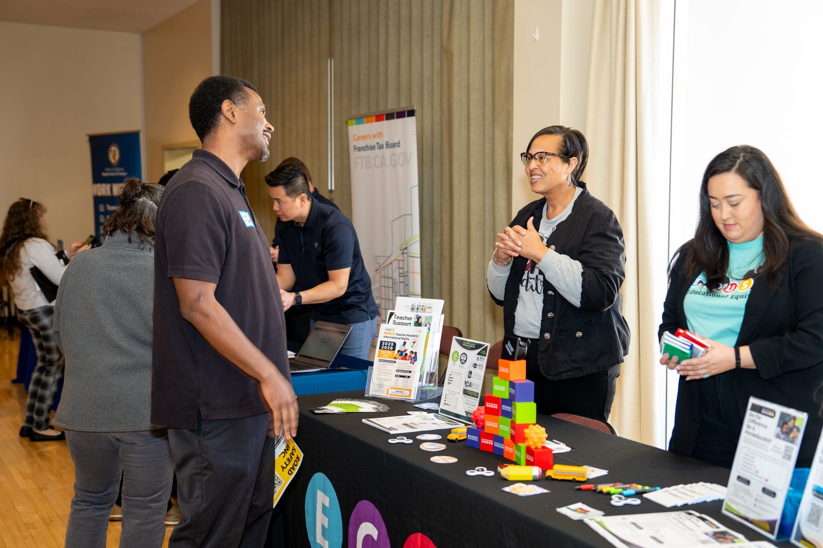 Educator speaking with a job seeker about teacher residency programs